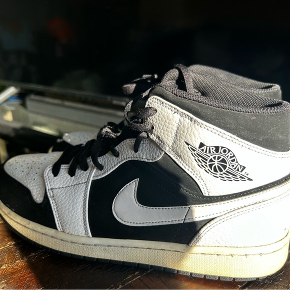 The Air Jordan 1 Mid White Black is a mid-top sneaker used some life left - Picture 10 of 12